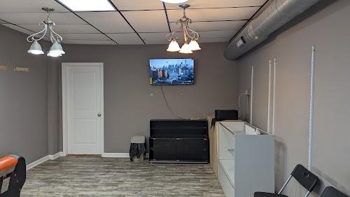 Khan Barber Shop, LLC